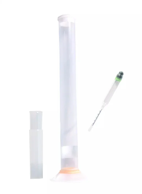 Pèse colostrum avec éprouvette